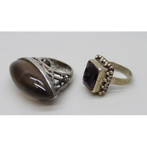 7112 - A large hallmarked silver ring and one other ring, both size N