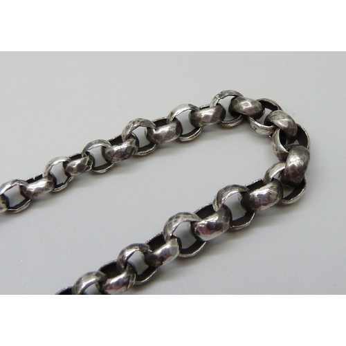 7138 - A silver watch chain with hammered effect links, 22g