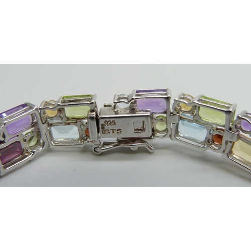 7144 - A silver multi-gem set bracelet