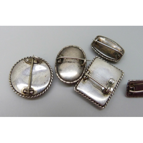 7150 - Five silver brooches, four by TLM and one after Charles Bestland