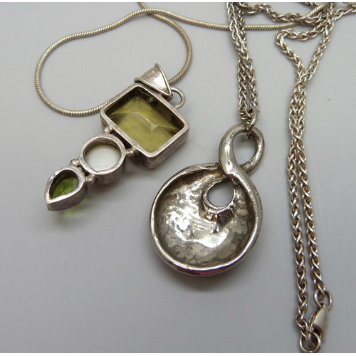 7156 - A silver stone set pendant, one other pendant and two silver chains