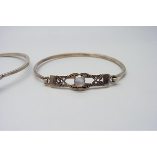 7160 - A Swedish silver bangle set with a cabochon amethyst by Borgila and one other silver bangle, (Borgil... 