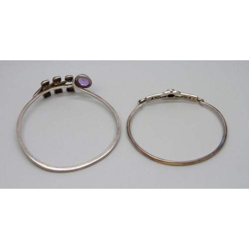 7160 - A Swedish silver bangle set with a cabochon amethyst by Borgila and one other silver bangle, (Borgil... 