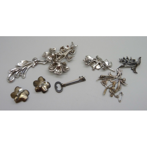 7162 - A 1950s hallmarked silver and paste set spray brooch, London 1955, and a collection of silver and ma... 