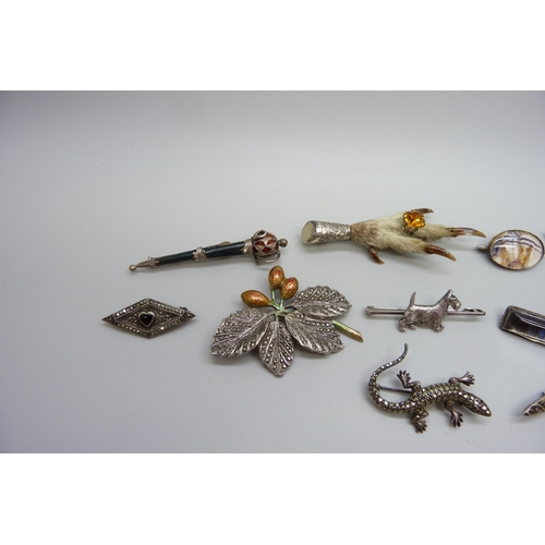 7165 - A collection of silver and other brooches, including silver Scottie brooch, silver bird brooch marke... 