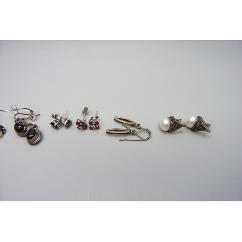 7166 - A collection of silver earrings, seven pairs