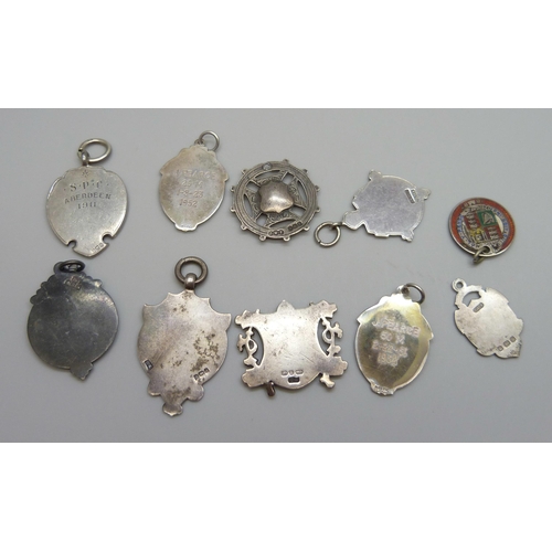 7170 - A collection of silver fob medals including one football, 44g