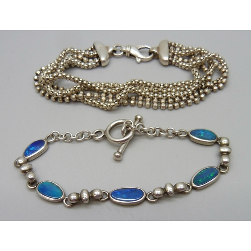 7175 - Two silver bracelets, one set with opals