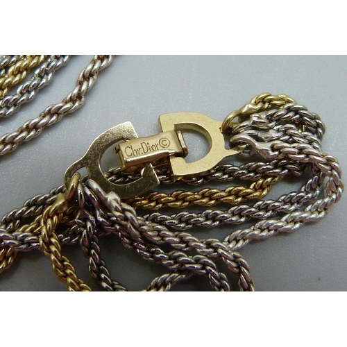 7183 - A long Christian Dior four-strand necklace, 90cm/36''