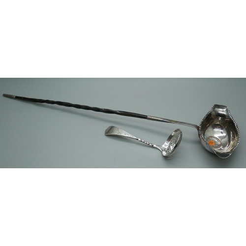 7336 - A silver sifter spoon, 23g, and a toddy ladle inset with a George III silver coin and with baleen ha... 