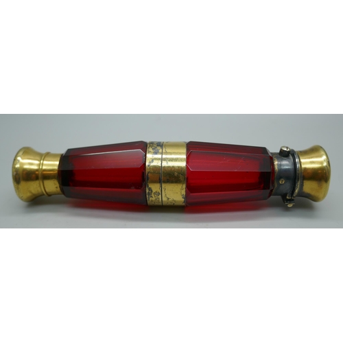 7340 - A gilt metal mounted ruby glass double scent bottle, marked Mordan in one lid, 122mm