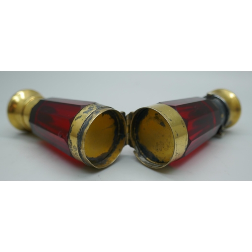 7340 - A gilt metal mounted ruby glass double scent bottle, marked Mordan in one lid, 122mm