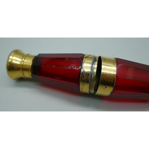 7340 - A gilt metal mounted ruby glass double scent bottle, marked Mordan in one lid, 122mm