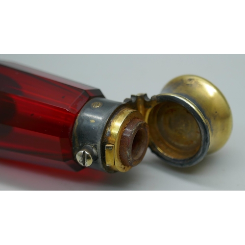 7340 - A gilt metal mounted ruby glass double scent bottle, marked Mordan in one lid, 122mm