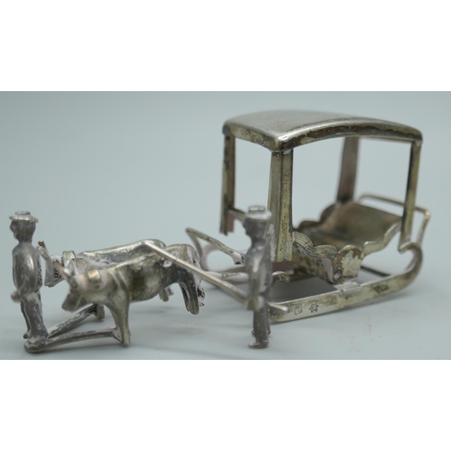 7341 - A miniature silver model of a sleigh, Portuguese control marks