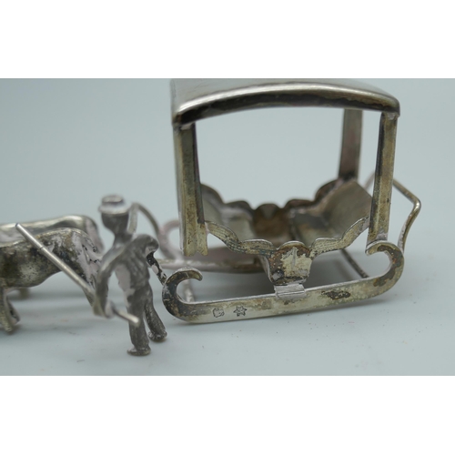 7341 - A miniature silver model of a sleigh, Portuguese control marks