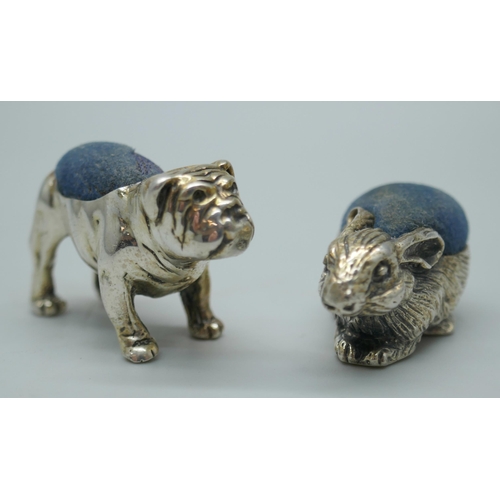 7348 - Two small novelty silver pin cushions, rabbit and bull-dog