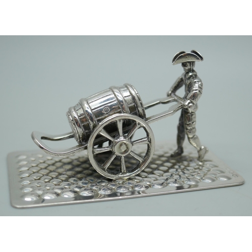 7350 - A novelty miniature silver model, gentleman with cart and barrel, Dutch control marks