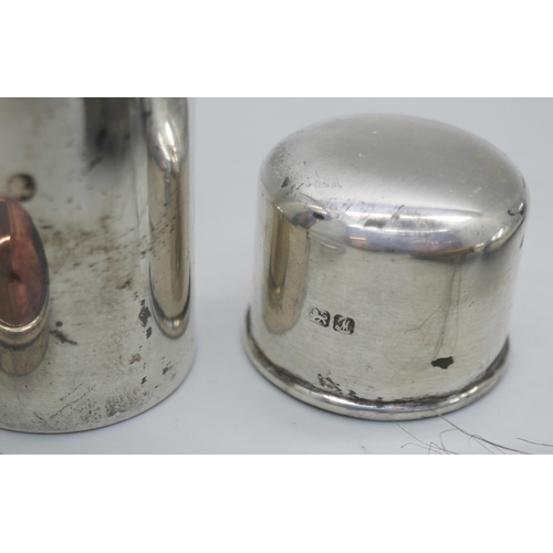 7352 - A silver shaving brush holder, Birmingham 1920, and a silver soap holder, Chester 1912