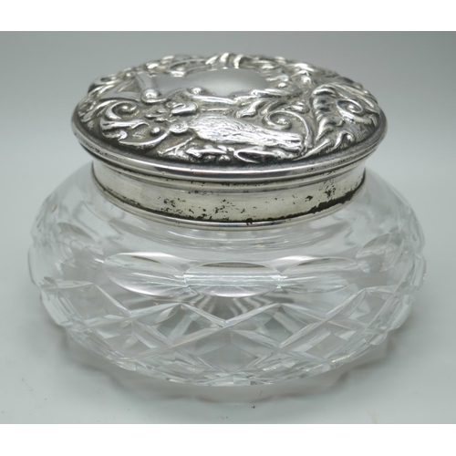 7353 - A silver topped glass powder jar with mirror in the lid, Birmingham 1974