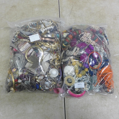 5071 - Two bags of assorted costume jewellery