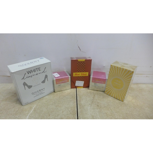 5073 - A quantity of unused perfumes and face creams including Giverny White Diamond, Hot Shot, Model Attit... 