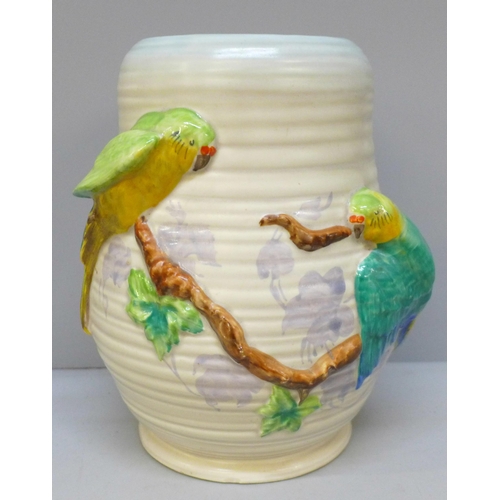 2004 - A Clarice Cliff Newport Pottery vase decorated with parrots, 21cm