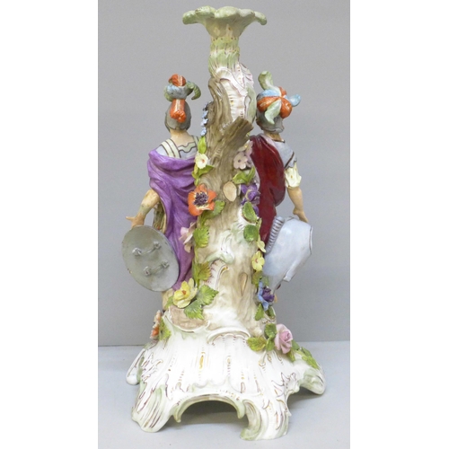 2009 - A German porcelain figural candlestick, a/f