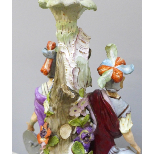 2009 - A German porcelain figural candlestick, a/f