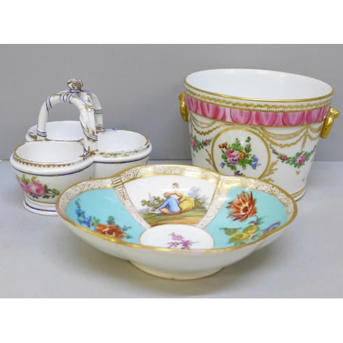 2025 - An 18th Century style continental porcelain cache pot with gilt ring handles, floral swag decoration... 