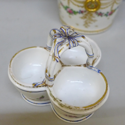 2025 - An 18th Century style continental porcelain cache pot with gilt ring handles, floral swag decoration... 