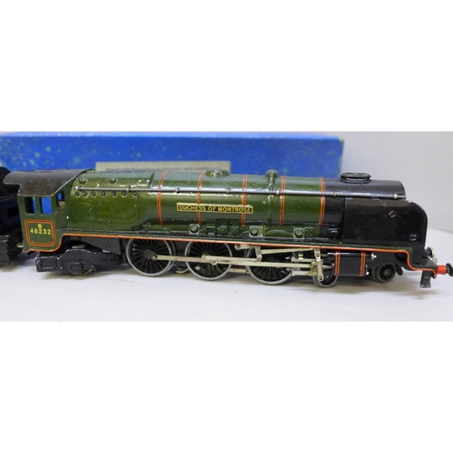 2028 - A Hornby OO gauge Duchess of Montrose locomotive, plus tender, horse box, high capacity wagon and si... 