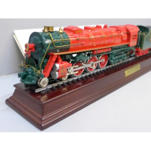 2042 - A Franklin Mint precision model - North Pole Ltd train and tender on display track