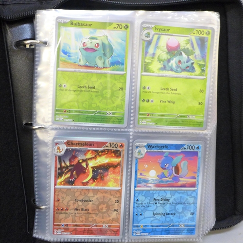 2043 - A full binder of scarlet and violet 151 part set of Pokémon cards, part set includes 105 holographic... 