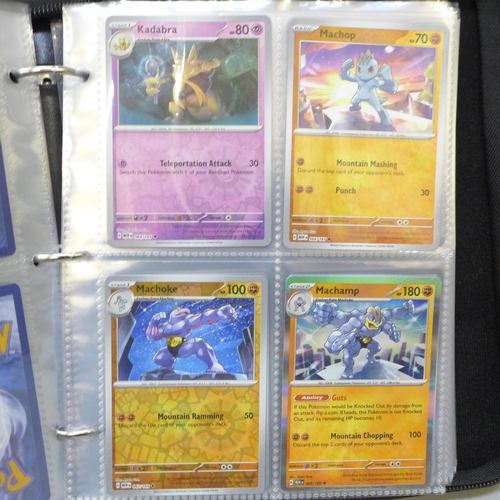 2043 - A full binder of scarlet and violet 151 part set of Pokémon cards, part set includes 105 holographic... 