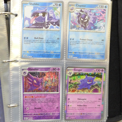 2043 - A full binder of scarlet and violet 151 part set of Pokémon cards, part set includes 105 holographic... 