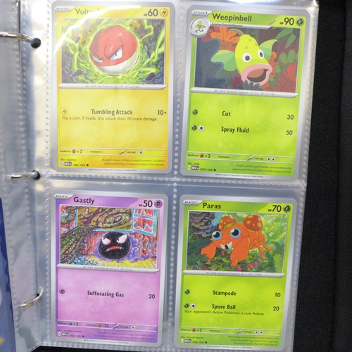 2043 - A full binder of scarlet and violet 151 part set of Pokémon cards, part set includes 105 holographic... 