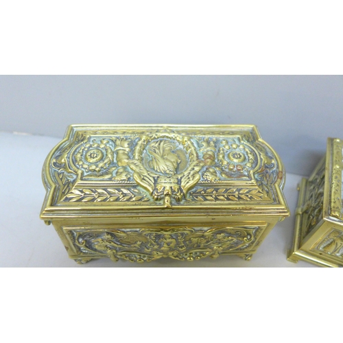 2050 - Two small solid brass caskets, 14cm wide