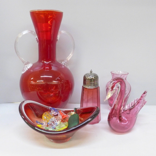 2054 - A cranberry glass two handled vase, one other vase, glass dish, swan, shaker, five glass sweets and ... 