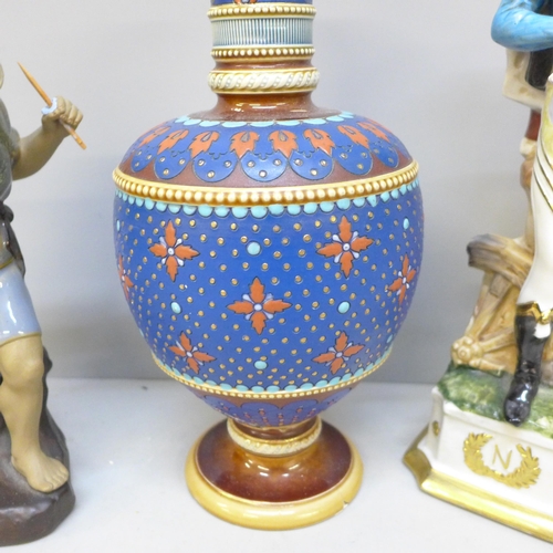 2061 - A Mettlach vase, a/f, a figure of a soldier and one other figure