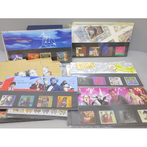 2064 - A collection of stamps, 23 Royal Mail mint stamp packs and albums