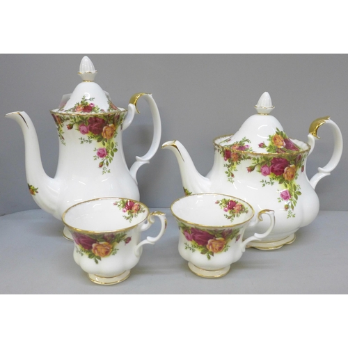 2074 - A Royal Albert Old Country Roses teapot, coffee pot and two cups, (coffee pot and cups second qualit... 