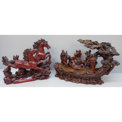 2079 - Two boxed Chinese resin figures; Galloping Horses and Eight Immortals, one Immortal repaired