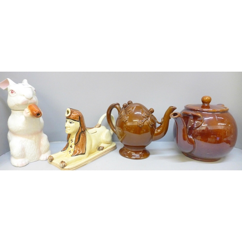 2082 - A large White Rabbit teapot and Sphinx teapot both by Tony Wood Studios, a large Brown Betty teapot ... 