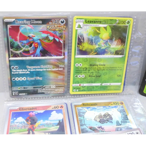 2090 - A box of over 600 Pokémon cards including holographic and rare cards with a large promo card