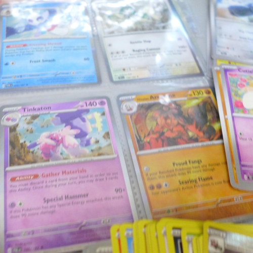 2090 - A box of over 600 Pokémon cards including holographic and rare cards with a large promo card