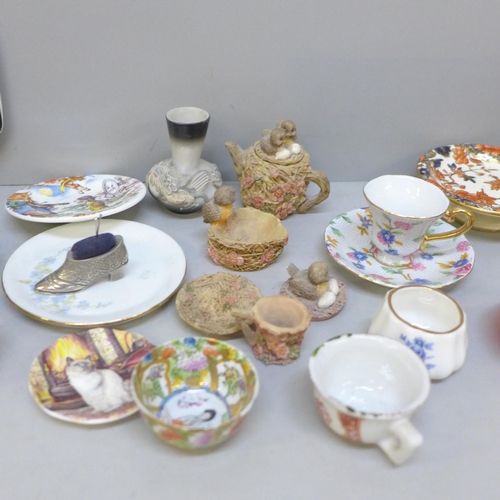 2092 - A box of miniature tea sets and other miniature porcelain