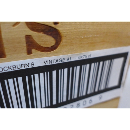 2103 - Six bottles of Cockburns 1991 vintage port, sealed in a wooden crate, with original receipt **PLEASE... 