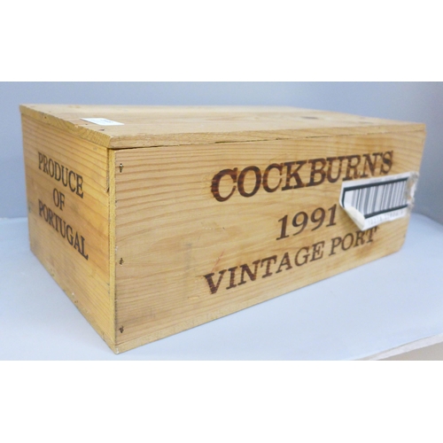 2103 - Six bottles of Cockburns 1991 vintage port, sealed in a wooden crate, with original receipt **PLEASE... 