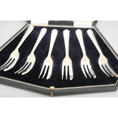 2106 - A collection of flatware including two cased sets